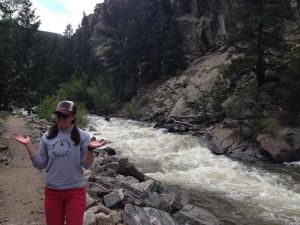 Me, looking glad to have survived a swim in Double Knife (background). Ironically, this rapid is just feet upstream of one of my favorite (super moderate) crags in the Canyon.
