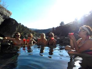 My vision of rafting was largely based on experiences at Radium Hot Springs. I'm sure it's just apple juice in those cups.